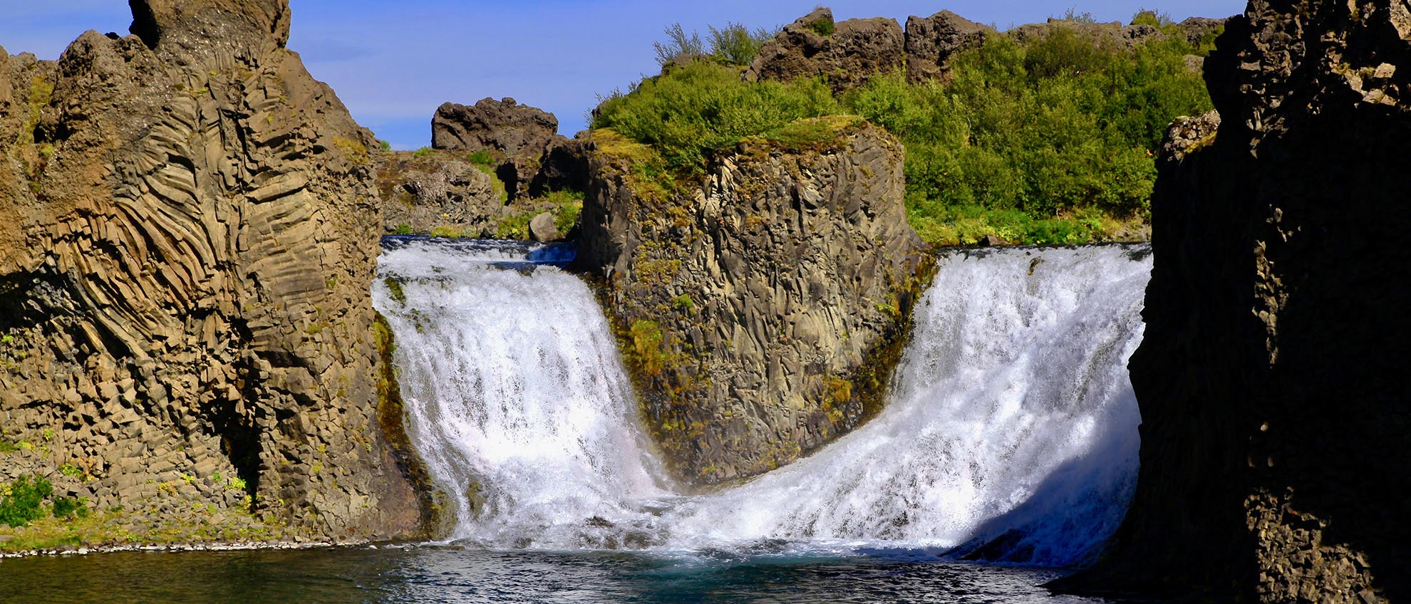 Hjálparfoss stands out for its unique beauty and remarkable accessibility