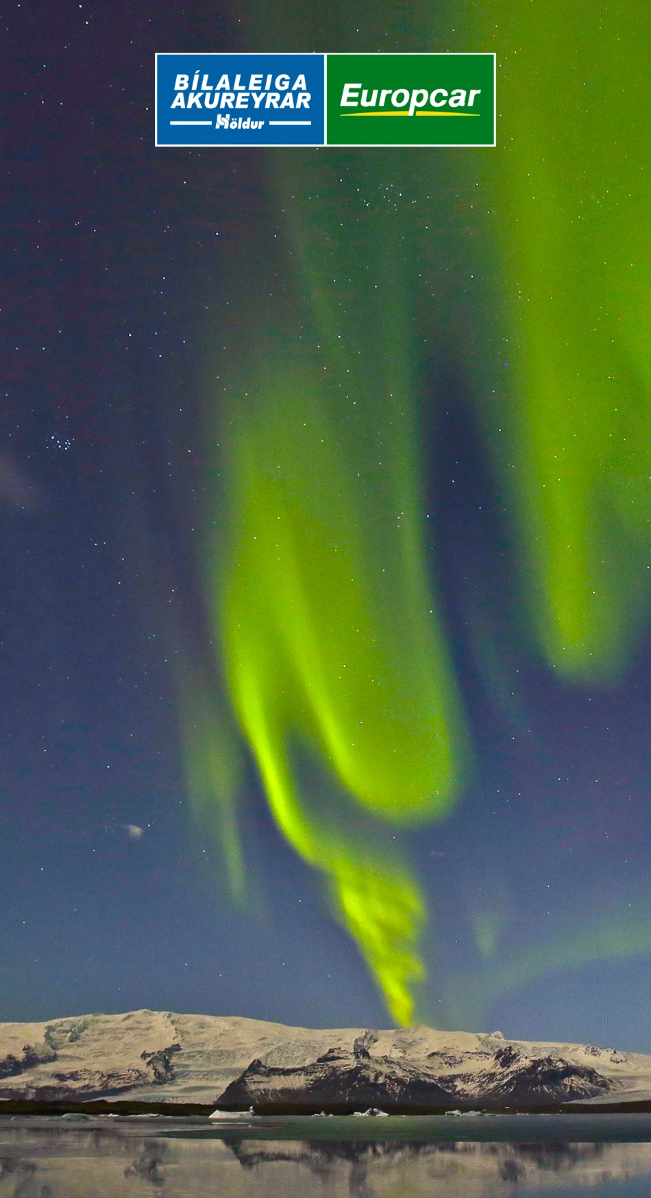 The northern light or aurora borealis dancing in the sky above Öræfajökull