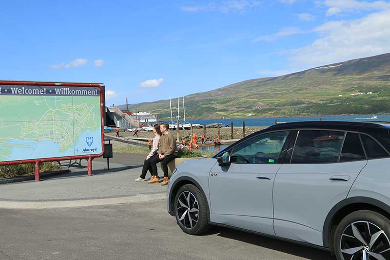 Volkswagen ID.5 from Europcar Holdur car rental in Iceland entering the town of Akureyri in th north