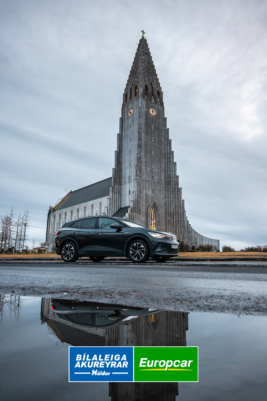 Volkswagen ID.4 EV next to Hallgrimskirkja in Reykjavik Iceland