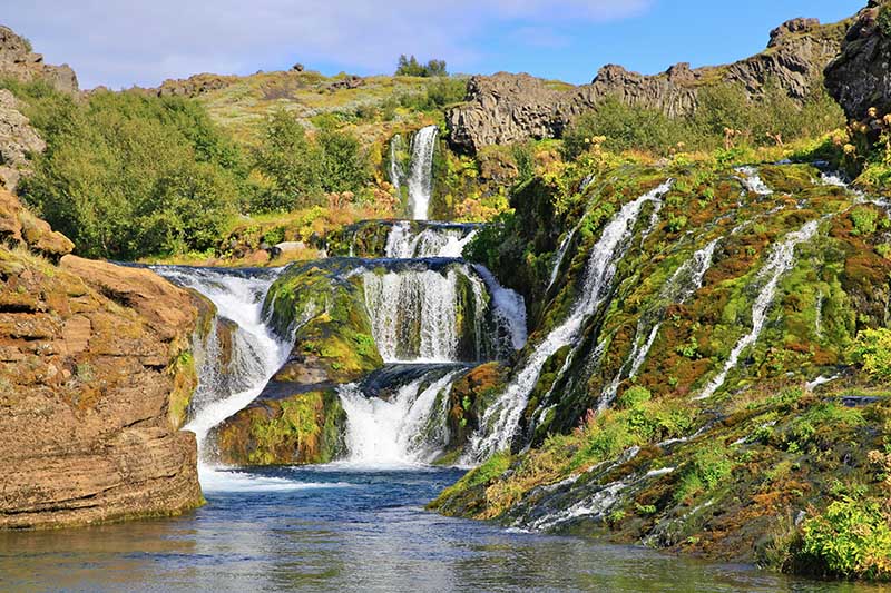 Gjain is a sunken oasis filled with small waterfalls, lush vegetation