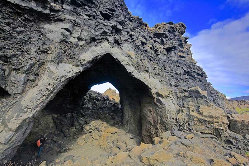 The iconic Kirkjan cave, also known as The Church, in the Dimmuborgir lava field.