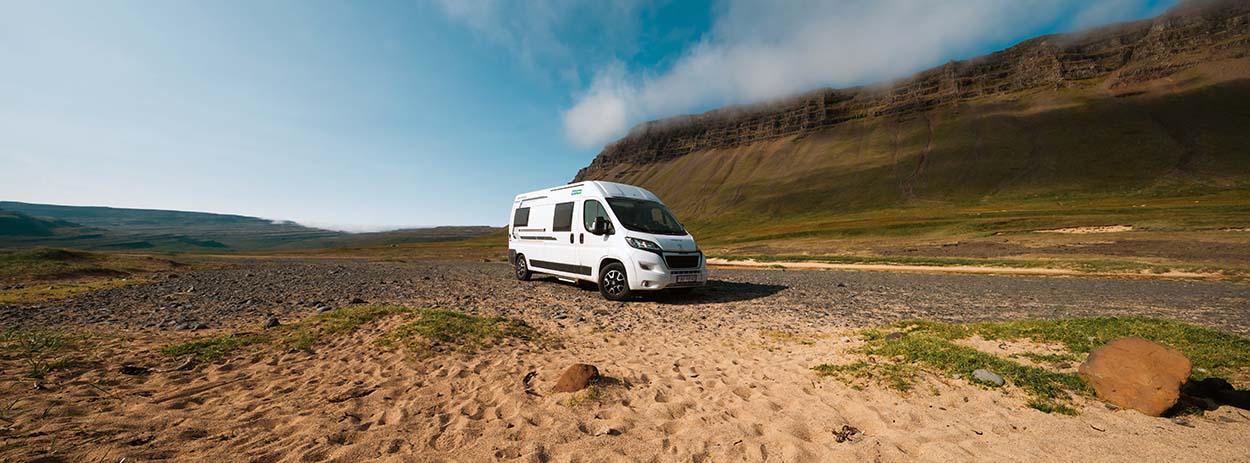 Camper van from Holdur Car rental driving on Ring-road-one on the Iceland south coast