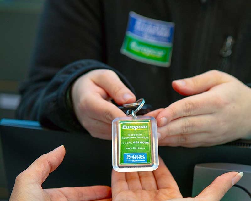 Handing Car Rental Key in Iceland Keflavik Airport