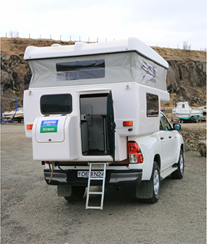 The ladder is pulled out to make easy access to the rent a Toyota Hilux 4x4 Camper in Iceland