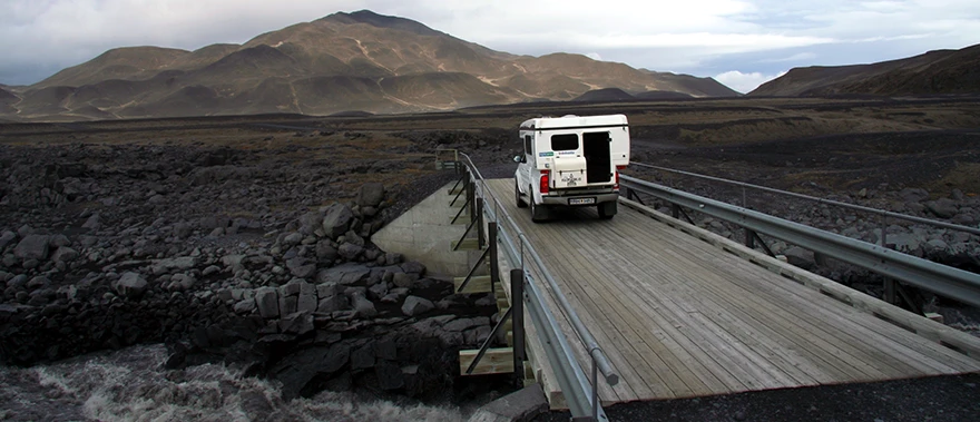 Here the sought after 4x4 Camper from Holdur Car Rental crosses a bridge in the Icelandic Highlands