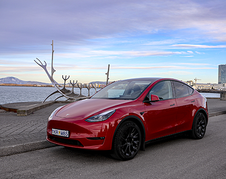 The Tesla Model Y is a popular EV to rent at Holdur car rental in Iceland